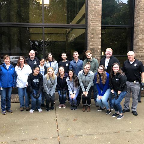 Photo of UK College of Pharmacy students with members of the Lexington Police Department