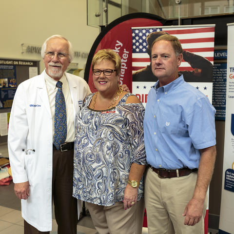 Photo of Dr. Edward Kasarskis, Patricia Peak, and Roddy Williams