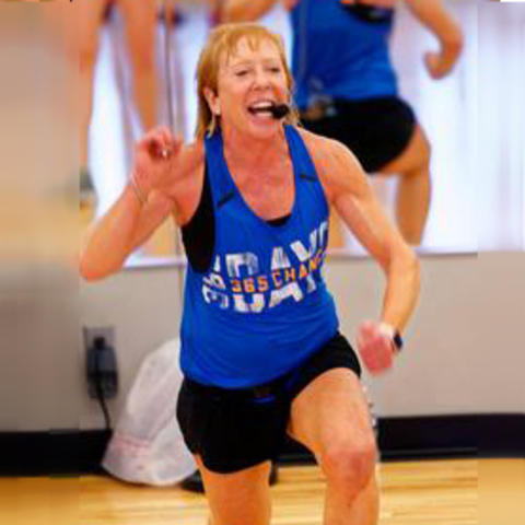 Lisa Hall teaches a fitness class.