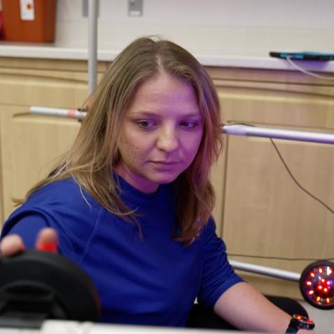 A woman in a lab setting 