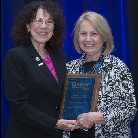 Photo of CHS associate dean Sharon Stewart with ASAHP president Linda Petrosino