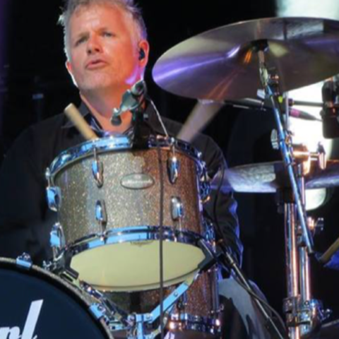 photo of Tom Hurst playing drums