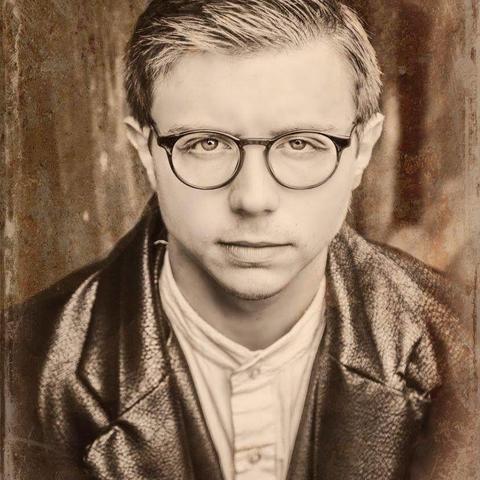 black and white headshot photo of Treyton Blackburn