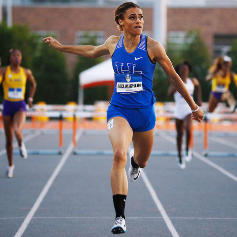 photo of Sydney McLaughlin running hurdles for UK in SEC competition