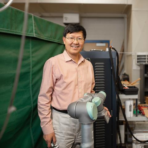 Photo of YuMing Zhang in the Lab