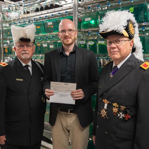 photo of Knights Templar presenting Oliver Voecking with check