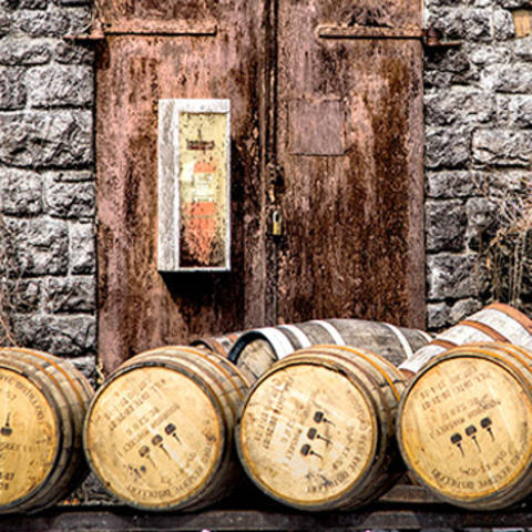 photo of bourbon barrels from "The Birth of Bourbon" by Carol Peachee