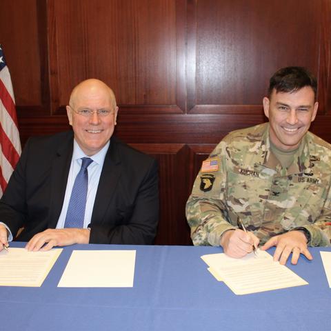 photo of David Blackwell and Col. Joseph Kuchan signing MOU
