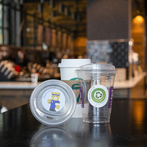 Plastic coffee cups in a coffee shop 