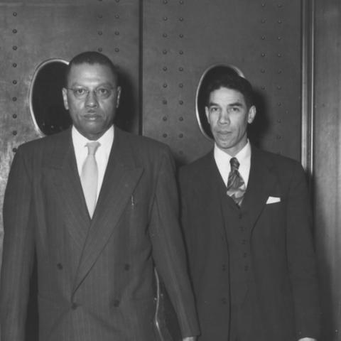photo of Lyman T. Johnson leaving court in 1949