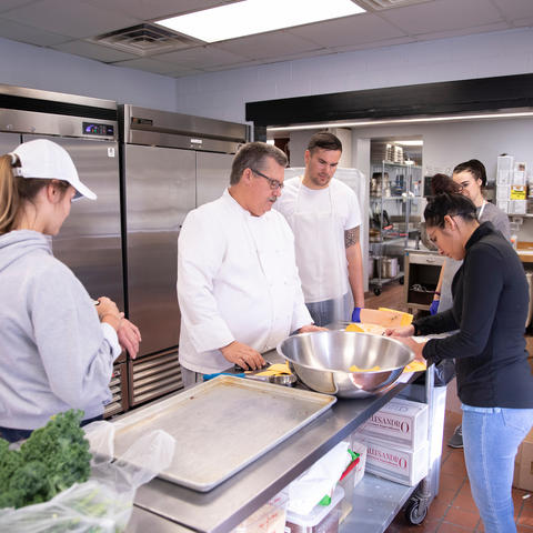 Chef Bob Perry instructs students in Erikson Hall kitchen