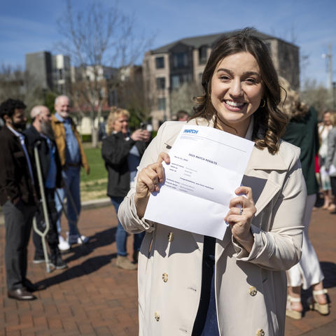Anna Cox, fourth-year student of the UK College of Medicine-Bowling Green Campus, shows off her match letter for internal medicine/pediatrics at UK.