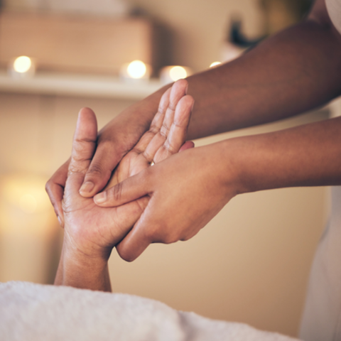Closeup of woman massaging hand for stress relief, comfort or zen in healing.