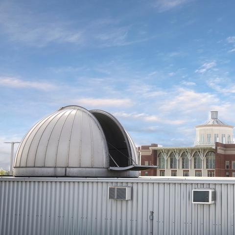 photo of MacAdam Student Observatory with Young Library in background
