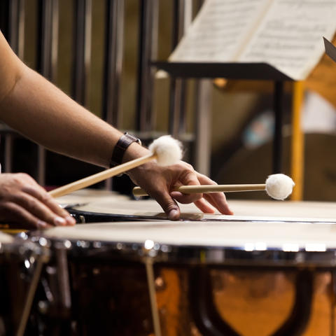 photo of hands playing timpani